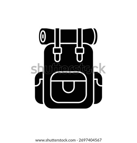 Black and white icon of backpack or rucksack in solid filled silhouette style