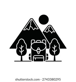 A black and white image of a camper van in front of mountains