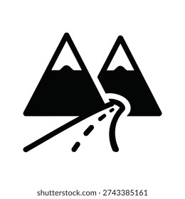 A black and white image of a road between two mountains