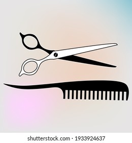 
Black and white image of scissors and comb