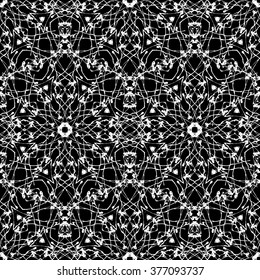 Black and white lace ethnic motifs seamless pattern.