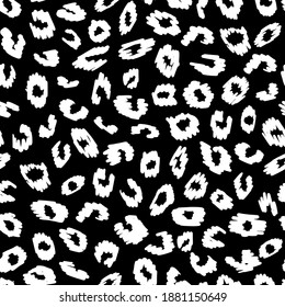 Black and white leo seamless pattern. Random placed animal all over print as all over.