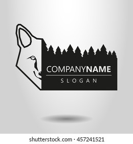 black and white logo with the forest and the fox