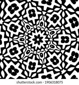 black and white mandala. symmetrical patterns.
