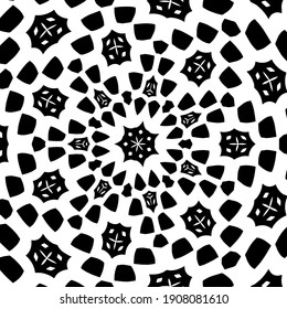 black and white mandala. symmetrical patterns.