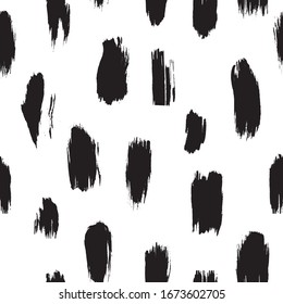 Black and white mod, stylish, and abstract paint splatters vector seamless pattern. Editable and separable 