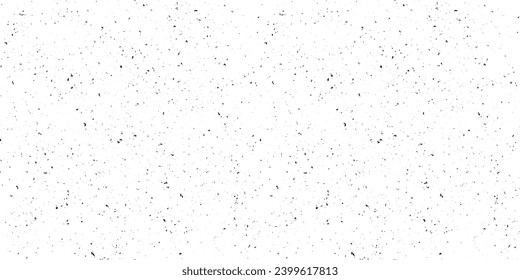 Black and white mottled seamless pattern. Small grunge sprinkles, particles, dust and spots wallpaper. Noise grain repeating background. Overlay random grit texture. Vector dotted backdrop