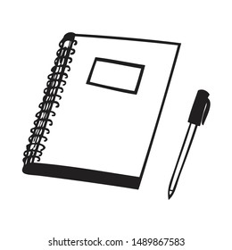 Black and white note book with white backdrop