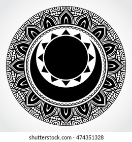black white ornamental mandala symbol with sun and moon