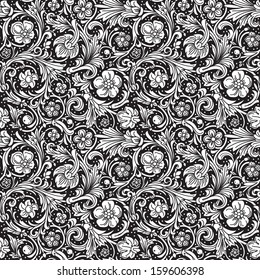 Black and white ornamental seamless vector pattern in baroque style. Stylized weave flowers and leaves on a black background. Renaissance.