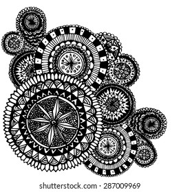 Black and white ornate hand drawn doodles with round mandala elements and paisleys. Coloring page for adults. Vector graphic tribal background.