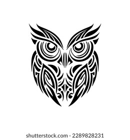 ﻿Tattoo of black and white owl adorned with Polynesian designs.