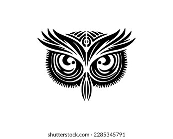 ﻿A black and white owl face tattoo adorned with Polynesian designs.