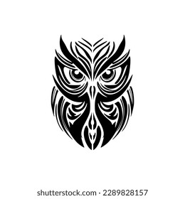 ﻿Tattoo of a black and white owl featuring Polynesian designs.