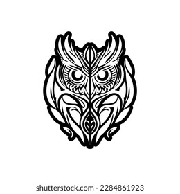 ﻿A black and white owl tattoo featuring Polynesian designs.