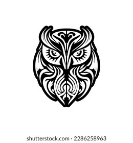 ﻿A black and white owl tattoo featuring Polynesian patterns.