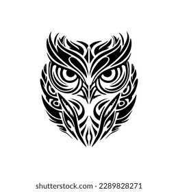 ﻿A black and white owl tattoo with Polynesian designs.