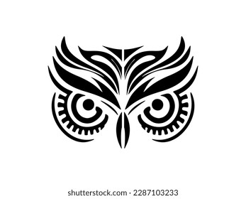 ﻿A black and white owl's face tattooed with Polynesian designs.