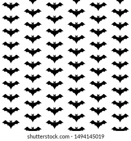 Black and white pattern with bat silhouettes on a white background for the design of Halloween holiday cards. Vector illustration with wild flying creatures.
