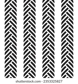 A black and white pattern border of tire treads