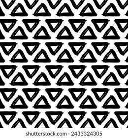 A black and white pattern with grunge-style triangle brushstrokes, symmetrically aligned horizontally. Versatile for wrapping paper, textiles, prints. Isolated on a white background.