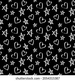 Black and white pattern of hearts and stars