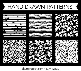 Black and white pattern with spots and blobs of paint or ink. Abstract background. Vector hand drawn textures. Seamless abstract background.