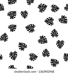 Black and white pattern of tropical leaves. Seamless background with palm leaves.