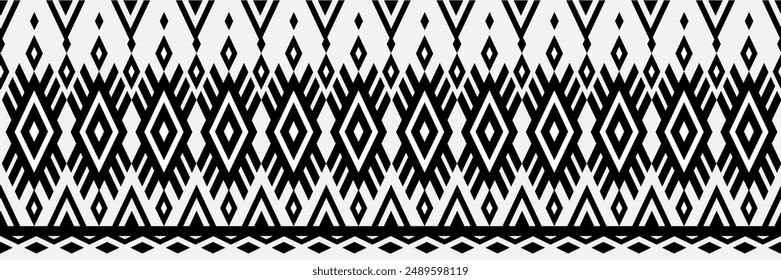A black and white patterned fabric with diamond shapes. The pattern is very intricate and detailed. The fabric is likely to be used for clothing or home decor