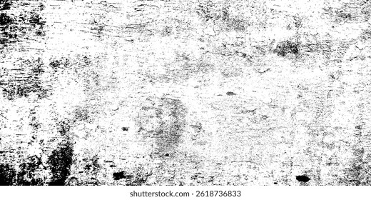 A black and white photo of a rock wall. The photo is of a large rock wall with a lot of texture and detail. The wall appears to be made of stone and has a rough, uneven surface