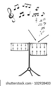 Black and white picture of two drums with notes.