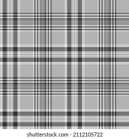 Black and white plaid pattern. Abstract seamless tartan background. Modern fashion cage texture. Of printing on fabrics, shirts, textiles, curtains. Vector graphic.