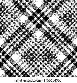 Black white plaid pattern seamless tartan texture. Herringbone check plaid graphic for skirt, throw, or other modern autumn winter fashion textile print.