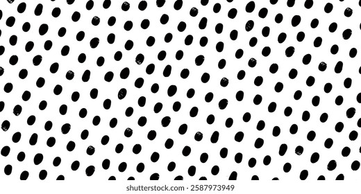 Black and white polka dot vector pattern.
