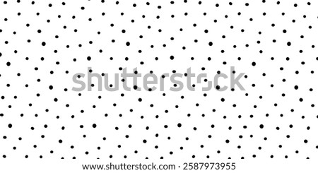 Black and white polka dot vector pattern.