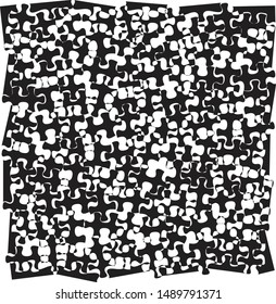 Black and white puzzle pieces overlapping, creating varied, abstract pattern