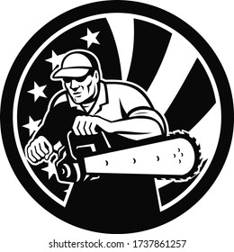 Black and White retro style illustration of an American lumberjack arborist or tree surgeon holding a chainsaw with USA star spangled banner or stars and stripes flag set inside circle isolated.
