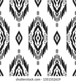 Black and white seamless background. Ethnic ikat, navajo, cherokee ornament. Vector illustration. Tribal pattern. Can be used for textile, wallpaper, wrapping paper, greeting card backdrop, print.