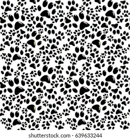 Black and white seamless background with black paws