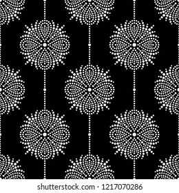 Black and white seamless garlands pattern of mosaic dotted flowers, snowflakes, stars. Floral lattice print of beads. Vector Illustration.