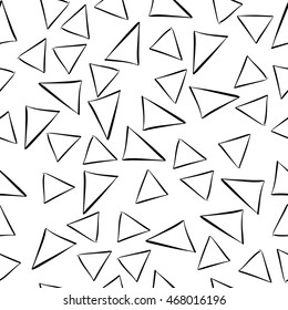 Black and white seamless hand drawn pattern with isolated triangles in doodle style for your design