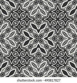 Black and white seamless lace pattern. Abstract geometric floral seamless background. Tribal ethnic ornate decoration, outline repeating texture. Vector doodle sketch pattern, graphic illustration