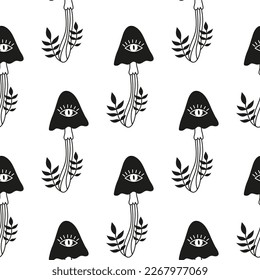 Black and white seamless pattern with boho celestial mushrooms, third eye and leafy twigs. Mystical background with funguses.