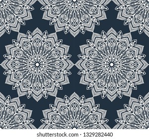 Black and white seamless pattern with decorative circles in the style of a mandala.  Vector illustration.