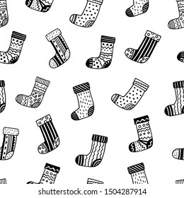 Black and white seamless pattern with different doodle socks.