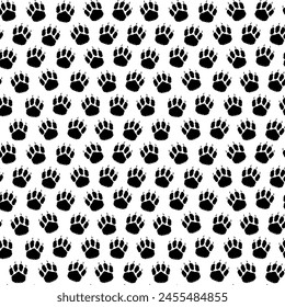Black and white seamless pattern of dog paw footprints. Silhouette. Puppy footprints. Fur pet paws with claws. Isolated on white background. Print, textile, wrapping paper