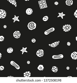 Black and white seamless pattern with doodle cookies, waffles and candies.
