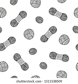 Black and white seamless pattern with doodle outline skeins and balls of yarn.