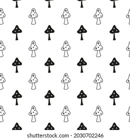 Black and white seamless pattern with doodle celestial boho mushrooms.