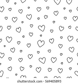 Black and white seamless pattern with doodle outline hearts.